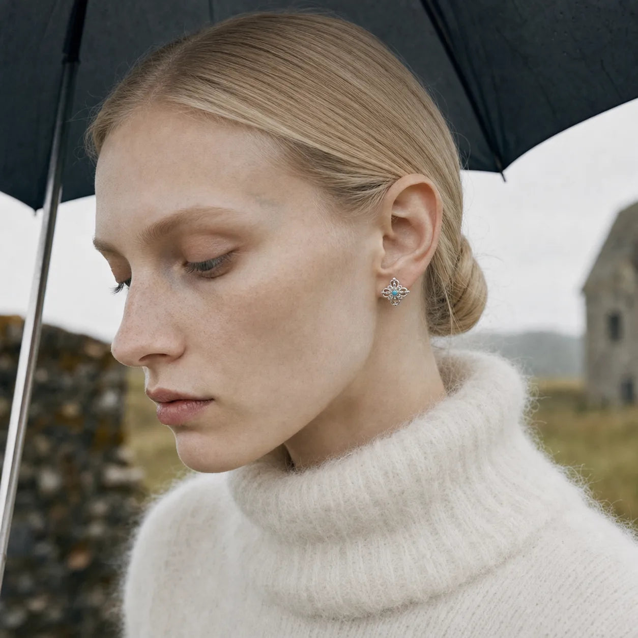 Vajra Stud Earrings - worn by model under an umbrella